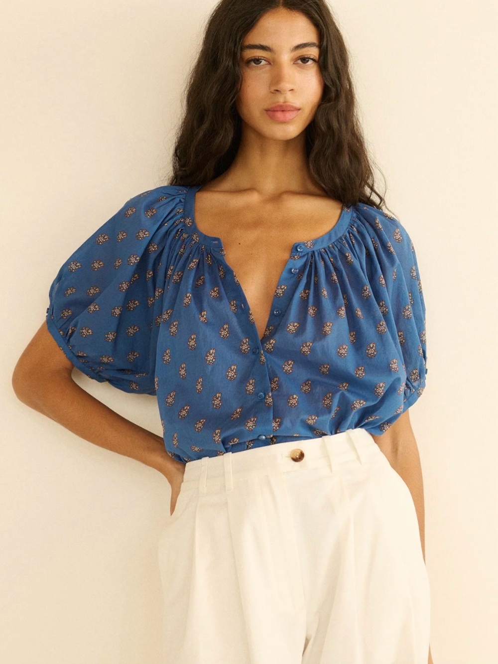Doen Blue Floral Peasant Blouse with Puff Sleeves. Button down. Button at arm.